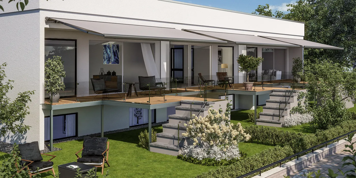 Gelenkarmmarkise über der langen Terrasse eines Bungalows